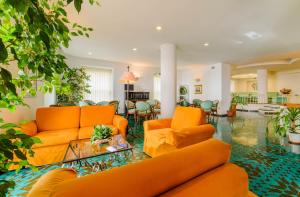 Posezení v ubytování Hotel La Bussola
