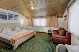 Posteľ alebo postele v izbe v ubytovaní Hotel-Restaurant Bike&Snow Lederer