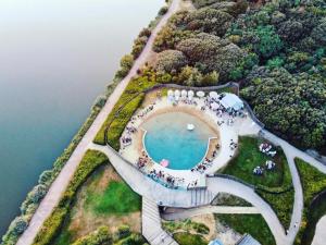 an overhead view of an island with a swimming pool at Appartement Cozy, 4 Pers, Centre-Ville, Proche Plage et Commerces - FR-1-92-877 in Les Sables-dʼOlonne +7 photos