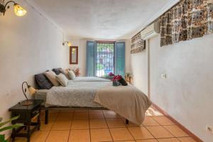 Posteľ alebo postele v izbe v ubytovaní Casa Lola Callosa + 37 fotografií