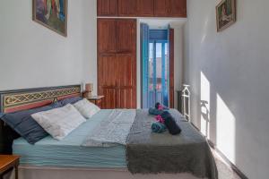 Posteľ alebo postele v izbe v ubytovaní Casa Lola Callosa