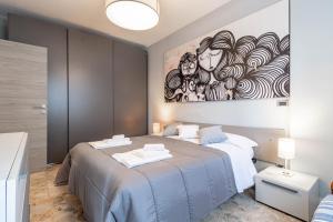 Ένα ή περισσότερα κρεβάτια σε δωμάτιο στο H11 [Mare Celeste] Centro - Mare