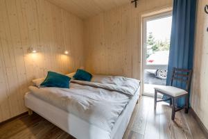 Postel nebo postele na pokoji v ubytování Giljagisting