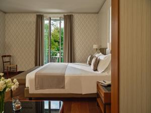 Кровать или кровати в номере Grand Hotel Miramare