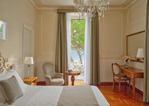 Кровать или кровати в номере Grand Hotel Miramare