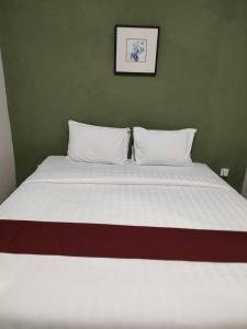 Postel nebo postele na pokoji v ubytování Donata House