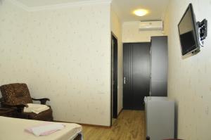 Μια τηλεόραση ή/και κέντρο ψυχαγωγίας στο Alma-Ata Hotel