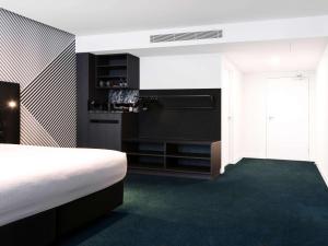Kuchyň nebo kuchyňský kout v ubytování Movenpick Hotel Melbourne On Spencer
