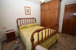 A bed or beds in a room at Casa Rural El Nido