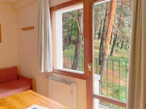 Postel nebo postele na pokoji v ubytování Apartamentos Midi 3000
