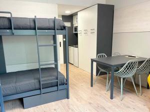 Kuchyň nebo kuchyňský kout v ubytování Apartamentos Midi 3000