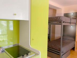 Kuchyň nebo kuchyňský kout v ubytování Apartamentos Midi 3000
