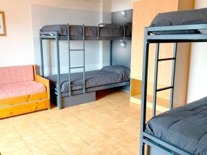Postel nebo postele na pokoji v ubytování Apartamentos Midi 3000