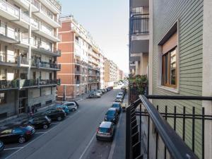 a view of a street with cars parked on the street at Baltimore House in Turin