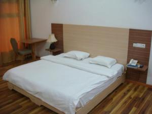 Postel nebo postele na pokoji v ubytování Jess Hotel