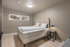 Postel nebo postele na pokoji v ubytování Enter Tromsø - 3 Bedroom Home