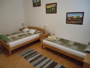 En eller flere senger på et rom på Prenoćište Vila Stara Breza