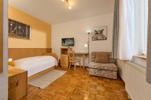 Postel nebo postele na pokoji v ubytování Hotel-Bio Gasthaus Am Felsenkeller