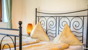 Letto o letti in una camera di Die Steirakeischn