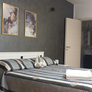 Postel nebo postele na pokoji v ubytování La Jacaranda Rooms