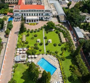 an aerial view of a large building with a garden at Hotel Shanker-Palatial Heritage Kathmandu in Kathmandu