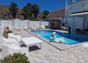 The swimming pool at or close to Villa Fantasia- Less than 5-Min Walk to Kalivaki Beach