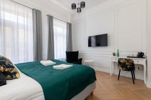 Posteľ alebo postele v izbe v ubytovaní Lwowska 9 - Cozy & Comfortable Studio by Noclegi Renters