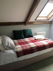 Postel nebo postele na pokoji v ubytování Llysfaen Cottage