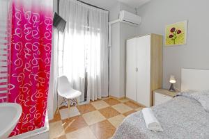Ein Bett oder Betten in einem Zimmer der Unterkunft Pensión Riosol