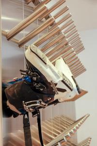 a pile of bags sitting on a shelf at Komfort-Ferienhaus Alpspitz in Grainau +2 photos