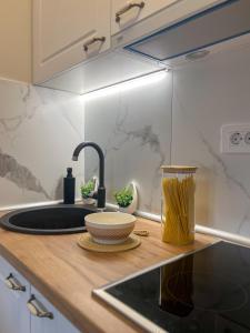 Una cocina o cocineta en Apartmani MM Zlatibor