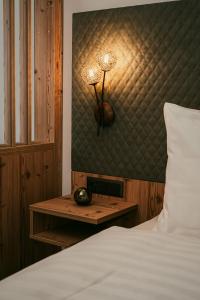 Posteľ alebo postele v izbe v ubytovaní Apparthotel Samson