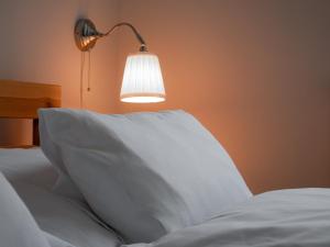 Postel nebo postele na pokoji v ubytování Apartmány u Maxíků