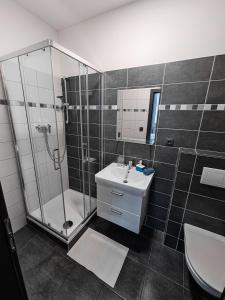 Koupelna v ubytování Apartmány u Maxíků