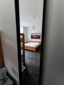 Postel nebo postele na pokoji v ubytování Apartmány u Maxíků