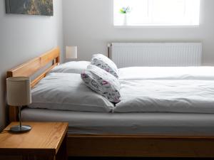 Postel nebo postele na pokoji v ubytování Apartmány u Maxíků