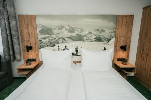 Posteľ alebo postele v izbe v ubytovaní Apparthotel Samson