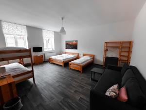 Postel nebo postele na pokoji v ubytování Apartmány u Maxíků
