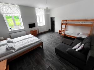 Postel nebo postele na pokoji v ubytování Apartmány u Maxíků