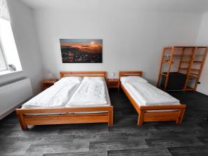 Postel nebo postele na pokoji v ubytování Apartmány u Maxíků