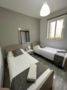Postel nebo postele na pokoji v ubytování F8 Room 2, Private Room two single beds shared bathroom in shared Flat