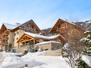 a home in the winter with snow on the ground at Appartement Valloire, 2 pièces, 4 personnes - FR-1-263-189 in Valloire