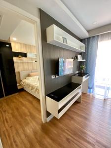 TV a/nebo společenská místnost v ubytování Dusit Park by NK