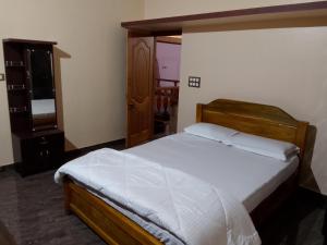 Кровать или кровати в номере Belandur farm inn