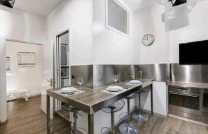 A kitchen or kitchenette at Residenza Tosca