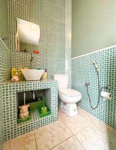 Ванная комната в Casa na serra Miguel Pereira 3 qtos ideal para famílias e grupos pequeno