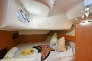 Een bed of bedden in een kamer bij S Odyssey 35243ib