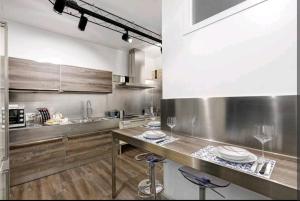A kitchen or kitchenette at Residenza Tosca