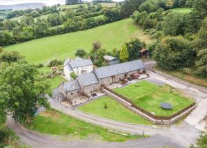 an aerial view of an estate with a large house at Sycamore Tree Barn in Brecon