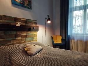 Posteľ alebo postele v izbe v ubytovaní Family Stay in Lviv (2 Rooms + Kitchen)